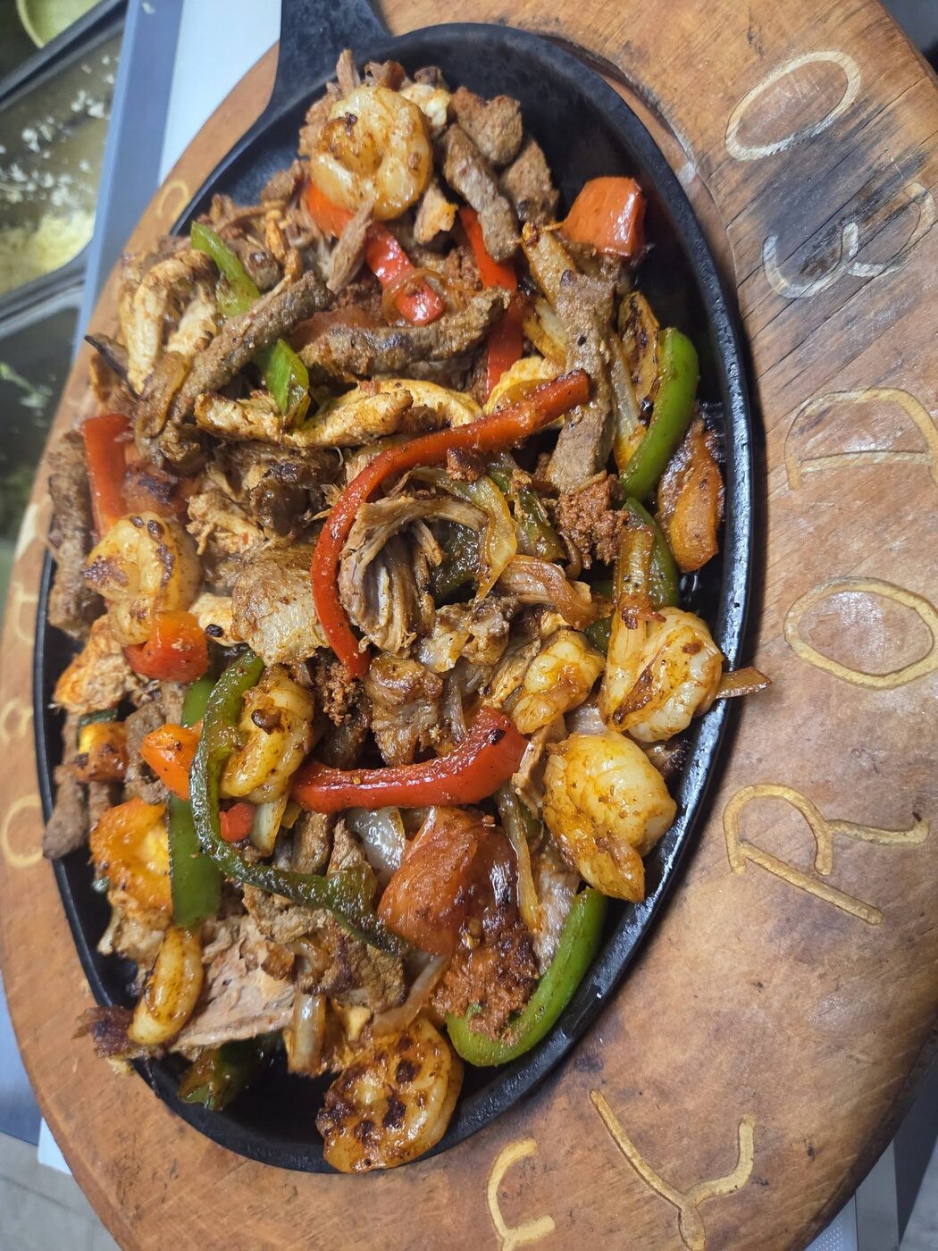 A loaded seafood and fajita plate