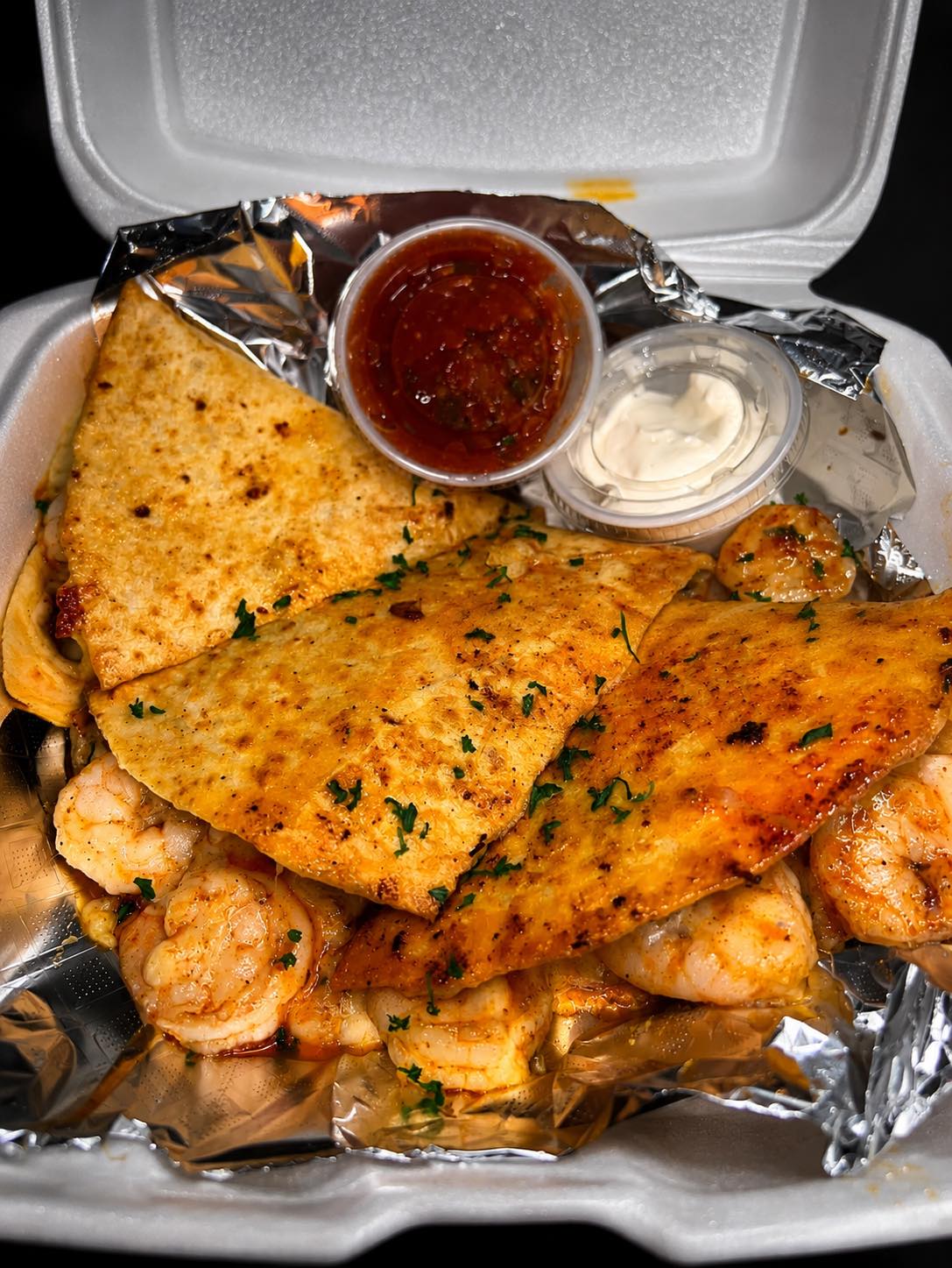Golden shrimp quesadillas with marinara and ranch dipping sauces